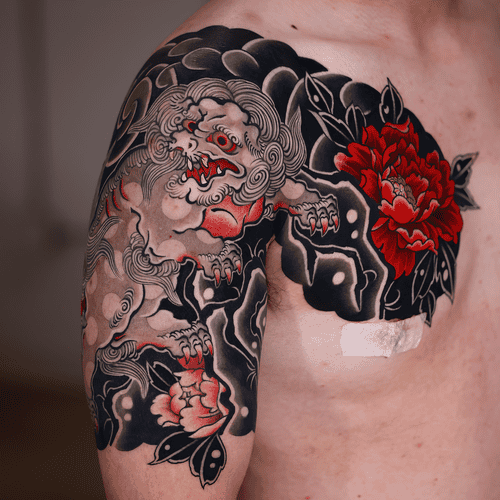 Hình Xăm Kỳ Lân Hoa Mẫu Đơn - Biểu tượng cho sự thuần khiết và may mắn.