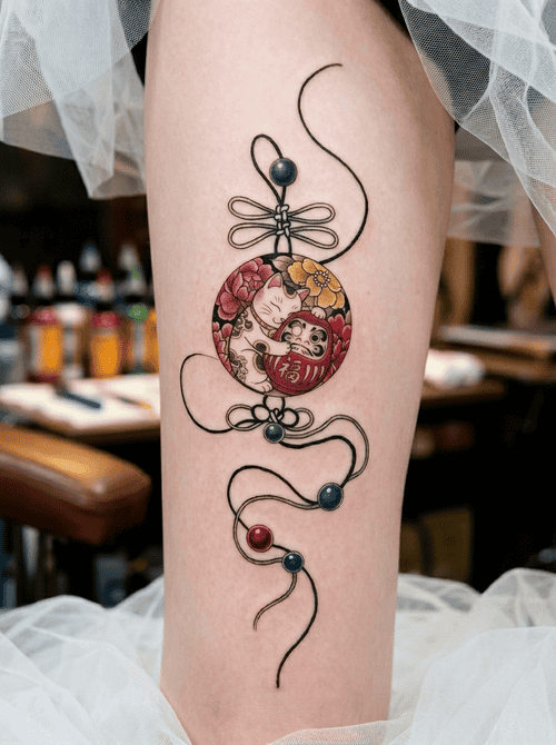 hinh-xam-meo-than-tai-va-daruma_4