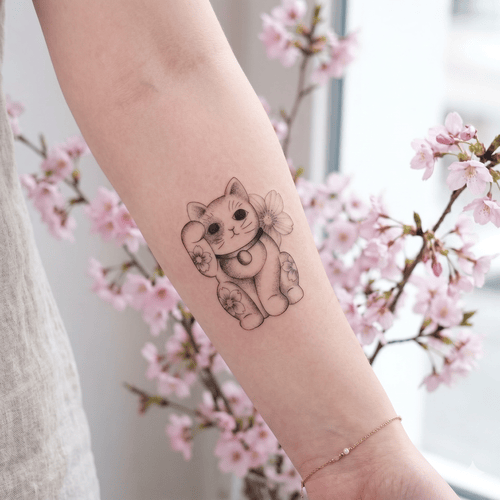 Hình xăm mèo thần tài cho nữ ý nghĩa