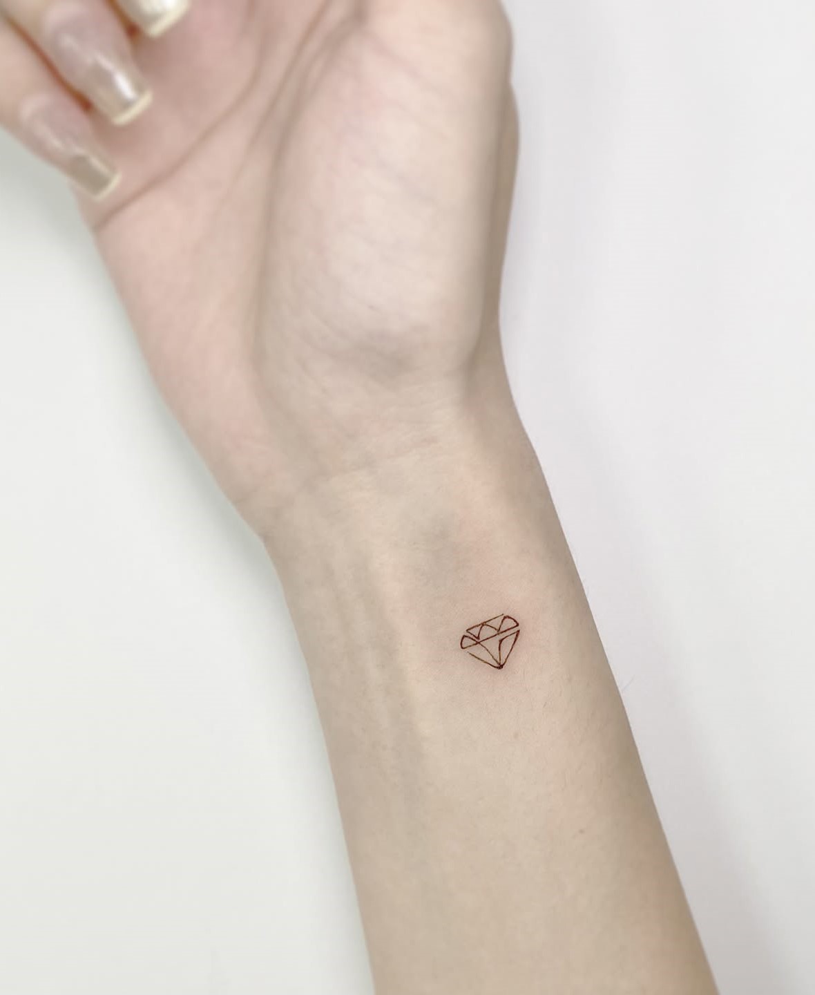 hinh-xam-kim-cuong-o-tay_03