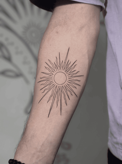 hinh-xam-mat-troi-cho-nam_5