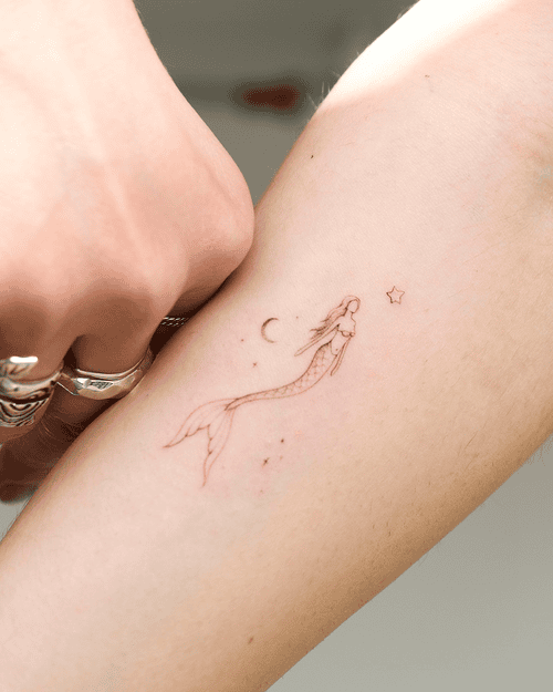 hinh-xam-nguoi-ca_22