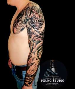 hinh-xam-ca-chep-hoa-rong-het-tay