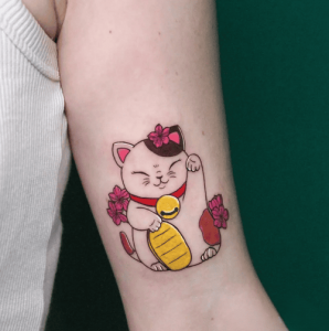 Hình Xăm Mèo Thần Tài Mini: Biểu Tượng May Mắn Tinh Tế