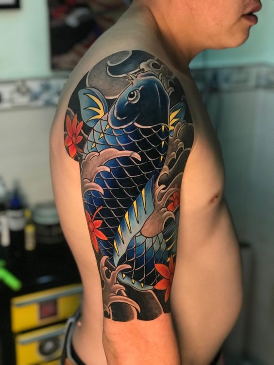 Hình xăm tattoo cá chép bắp chân nghệ thuật phong thủy may mắn